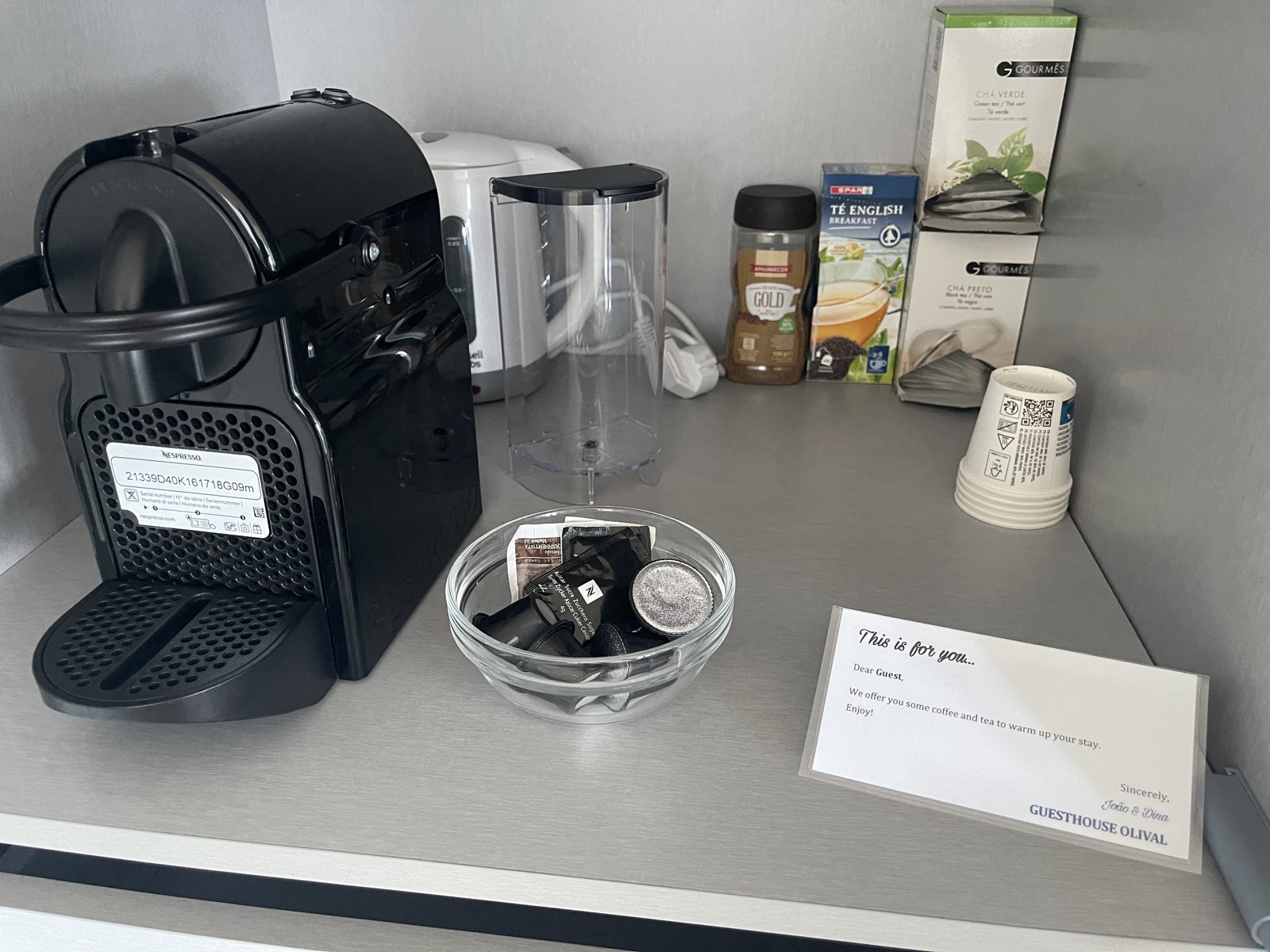 Coffee station with Nespresso machine, teas and a welcome card at Guesthouse Olival, Madeira